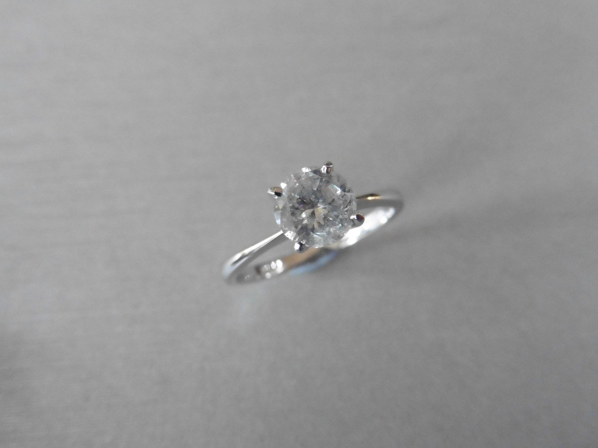 1.20ct diamond solitaire ring set with an enhanced brilliant cut diamond, H colour I1-2 clarity. 4