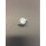 2ct diamond set solitaire ring. Brilliant cut diamond D colour and Si3 clarity. Halo setting which