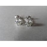 1.90ct Diamond set solitaire style earrings. Each set with a brilliant cut diamond, J colour, i1 cl