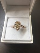 1.47ct pear shaped diamond set ring. Fancy yellow pear diamond, I1 clarity. Set in platinum. GIA ce