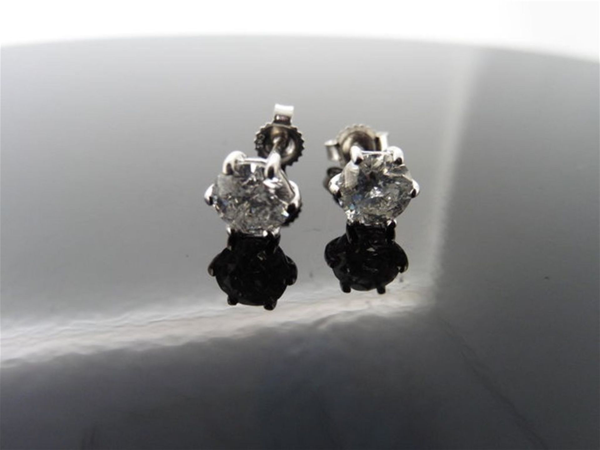 1.40ct Diamond solitaire earrings set with brilliant cut diamonds, I/J colour I1 clarity. Six claw