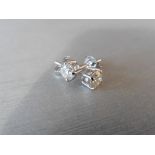 1.40ct Diamond solitaire earrings set with brilliant cut diamonds, I colour I1 clarity.