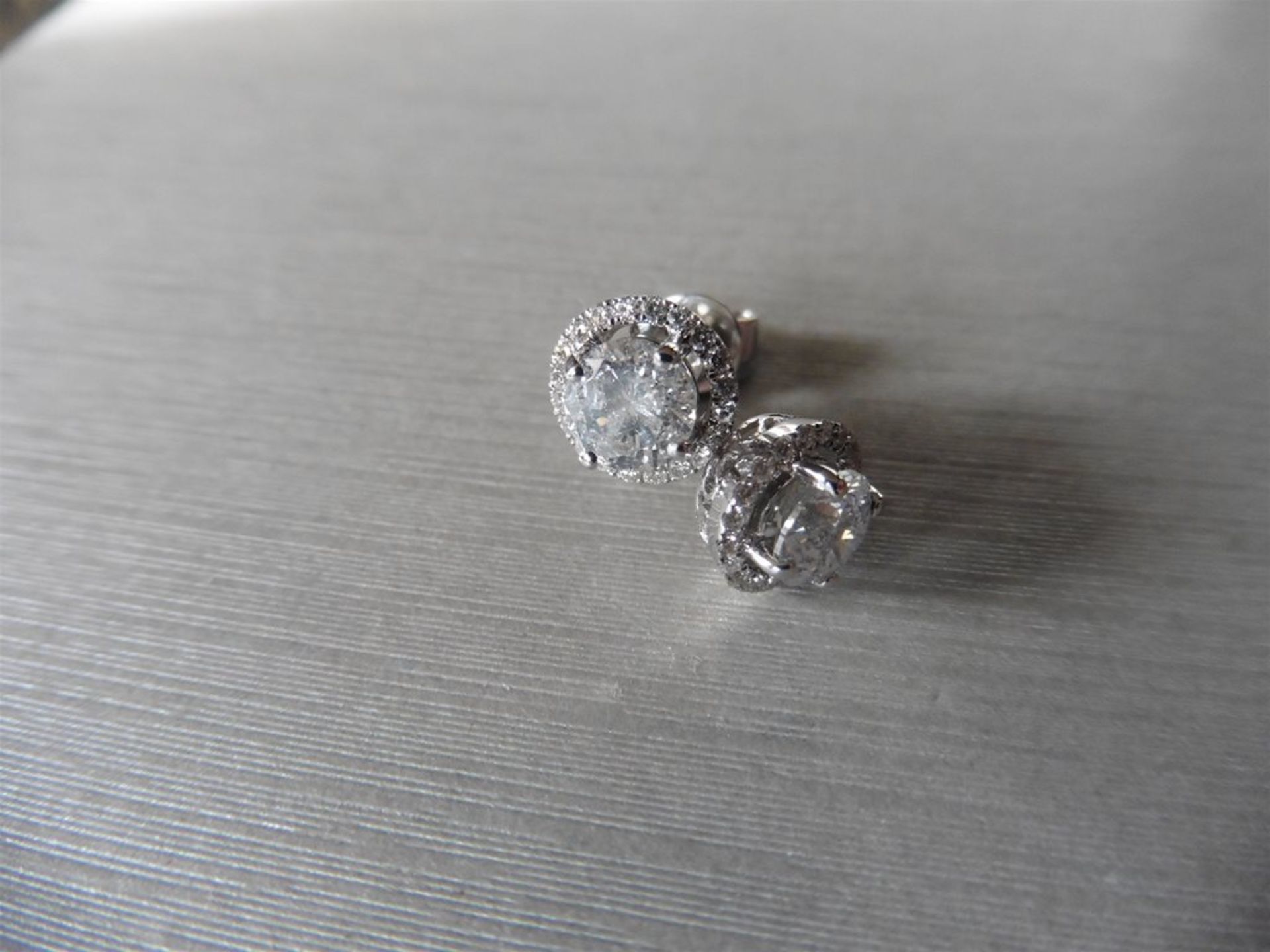 1.40ct Diamond set solitaire style earrings. Each set with 0.70ct brilliant cut diamond, I colour - Image 2 of 3