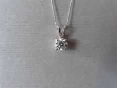 0.70ct diamond solitaire pendant. I colour, I1 clarity. Set in a platinum 4 claw mount with a split