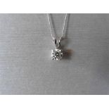 0.70ct diamond solitaire pendant. I colour, I1 clarity. Set in a platinum 4 claw mount with a split