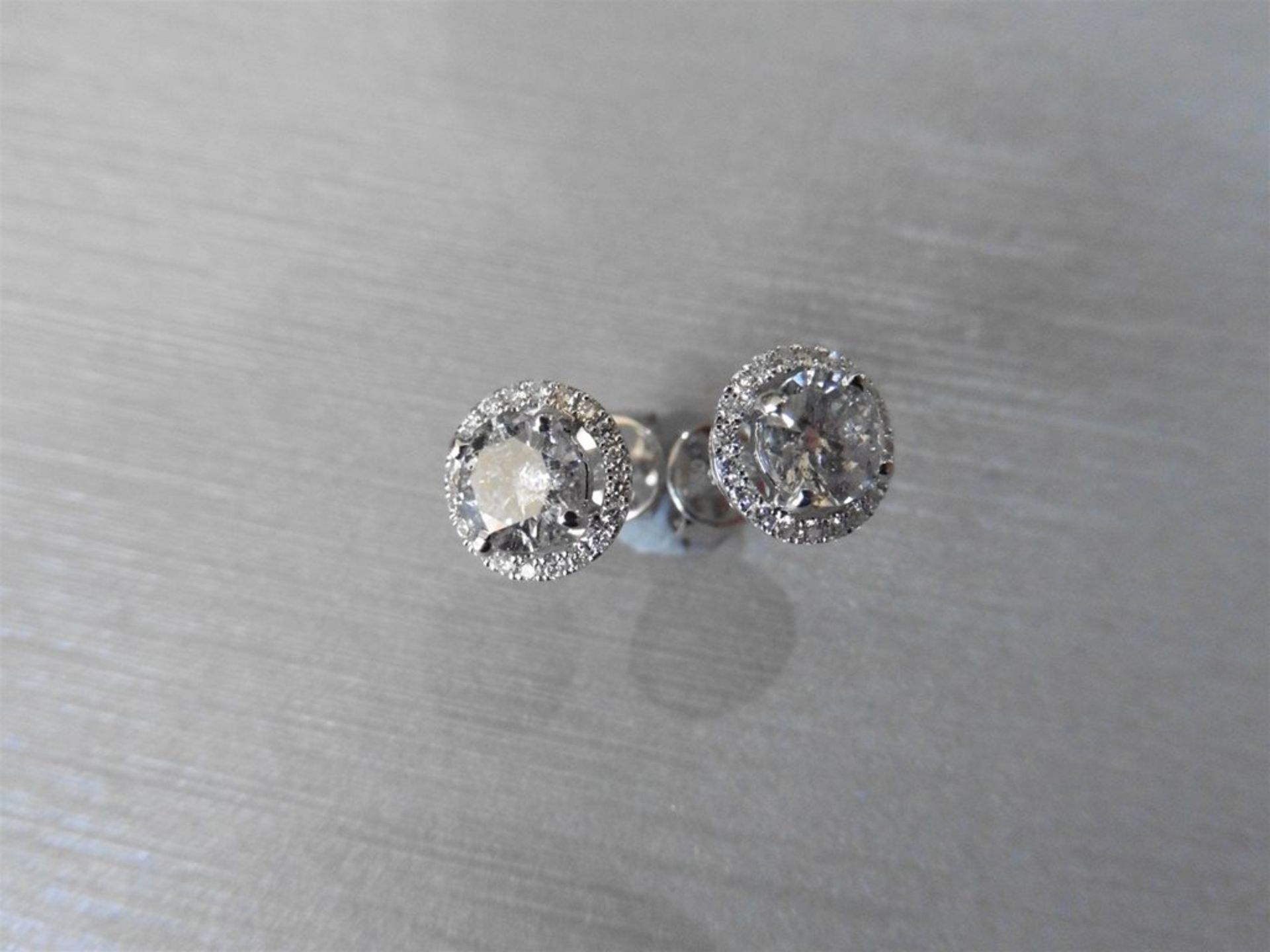 2.00ct Diamond set solitaire style earrings. Each set with 1ct brilliant cut diamond