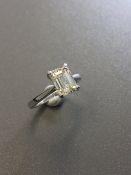 2ct diamond solitaire ring set with an emerald cut diamond, N ( light brown ) colour and VS1 clarity