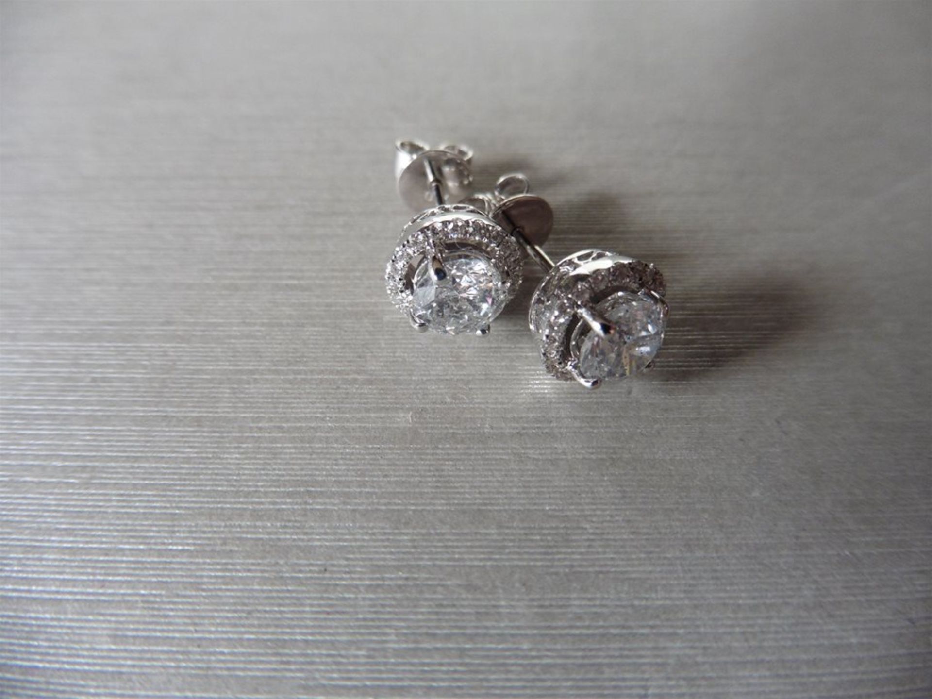 1.40ct Diamond set solitaire style earrings. Each set with 0.70ct brilliant cut diamond, I colour - Image 3 of 3