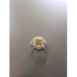 1.15ct diamond set solitaire ring with a yellow cushion cut yellow diamond and a halo setting and sp