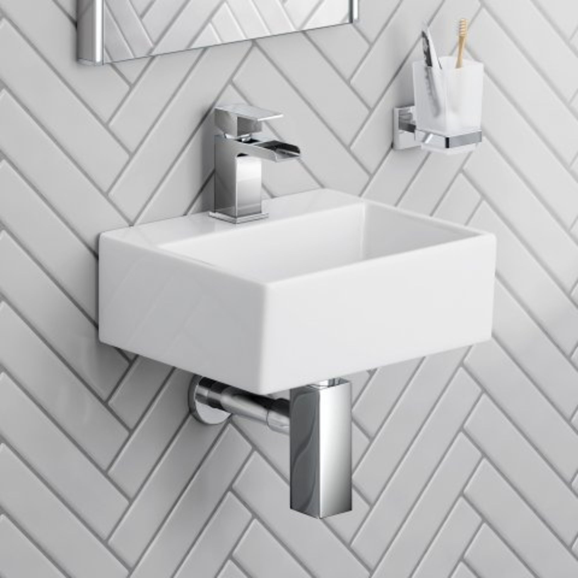 (O49) Rita Wall Hung Cloakroom Basin - Small. RRP £74.99. If you want to save space in your