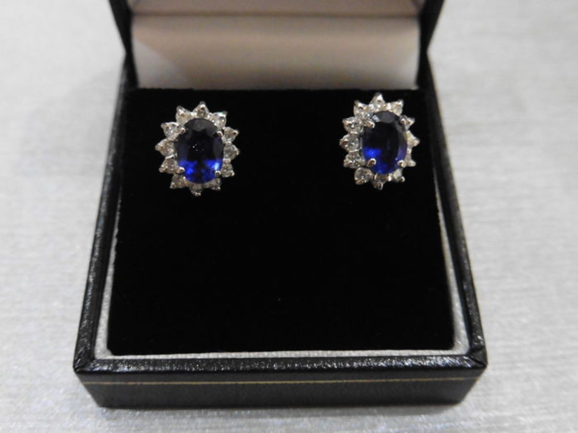 1.60ct Sapphire and Diamond cluster style stud earrings. Each Sapphire measures 7mm x 5mm and is - Image 4 of 4