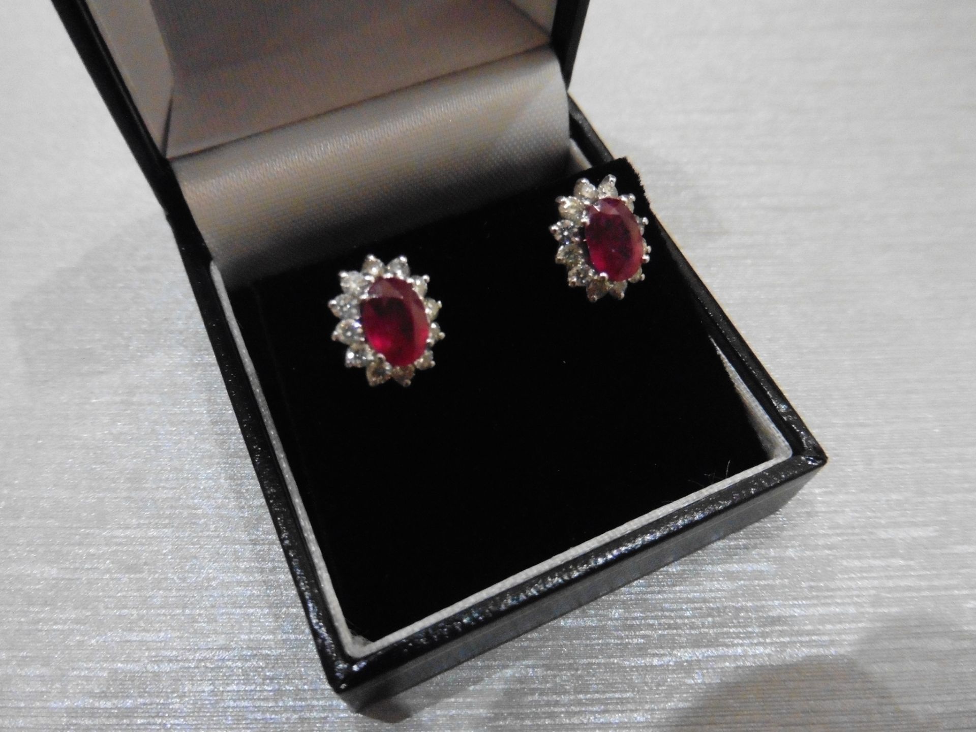 1.60ct ruby and Diamond cluster style stud earrings. Each ruby ( glass filled ) measures 7mm x 5mm - Image 4 of 4
