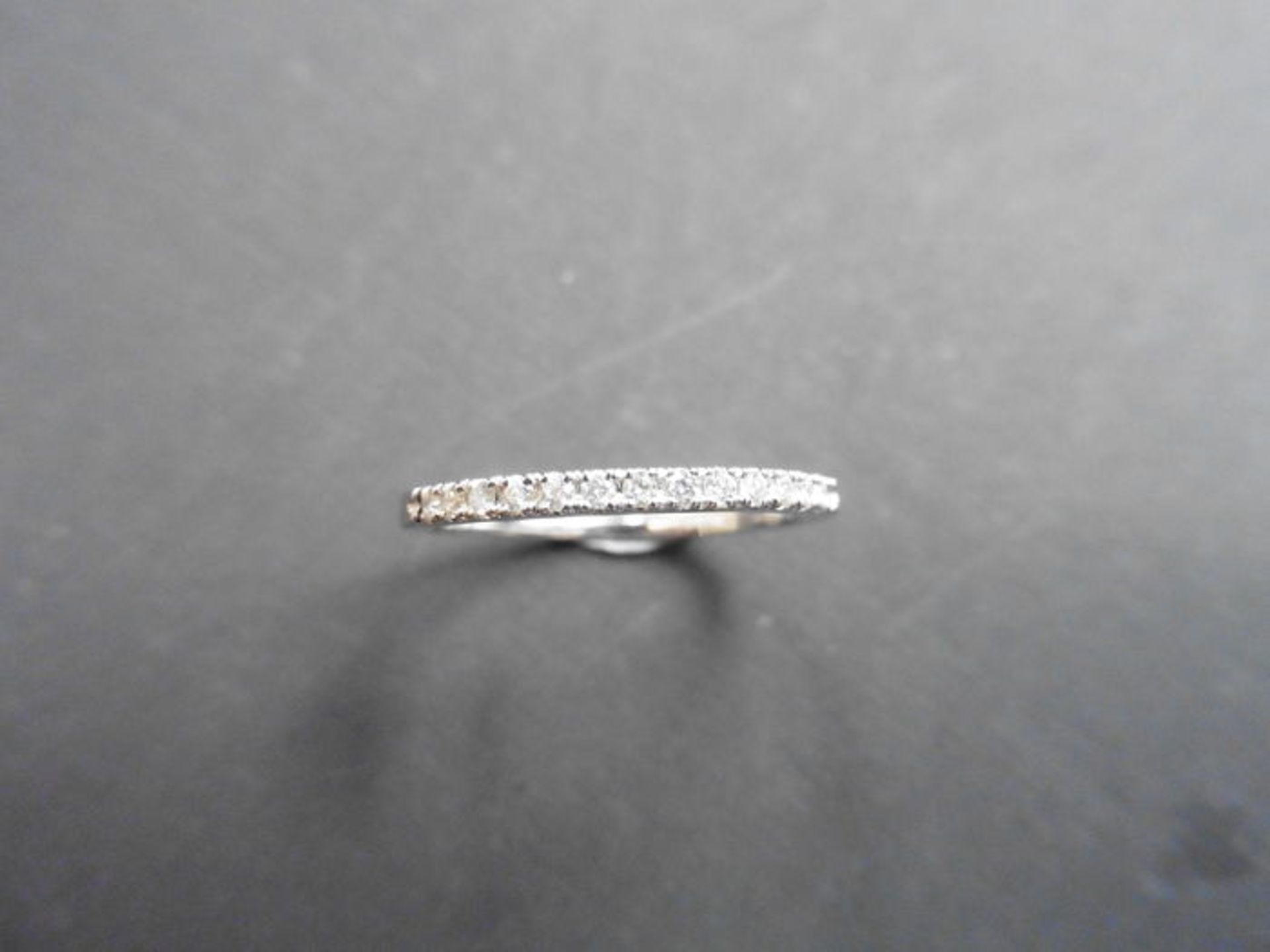 0.13ct diamond eternity ring set in 14ct white gold size L. I colour, si2 clarity in a micro claw - Image 3 of 3