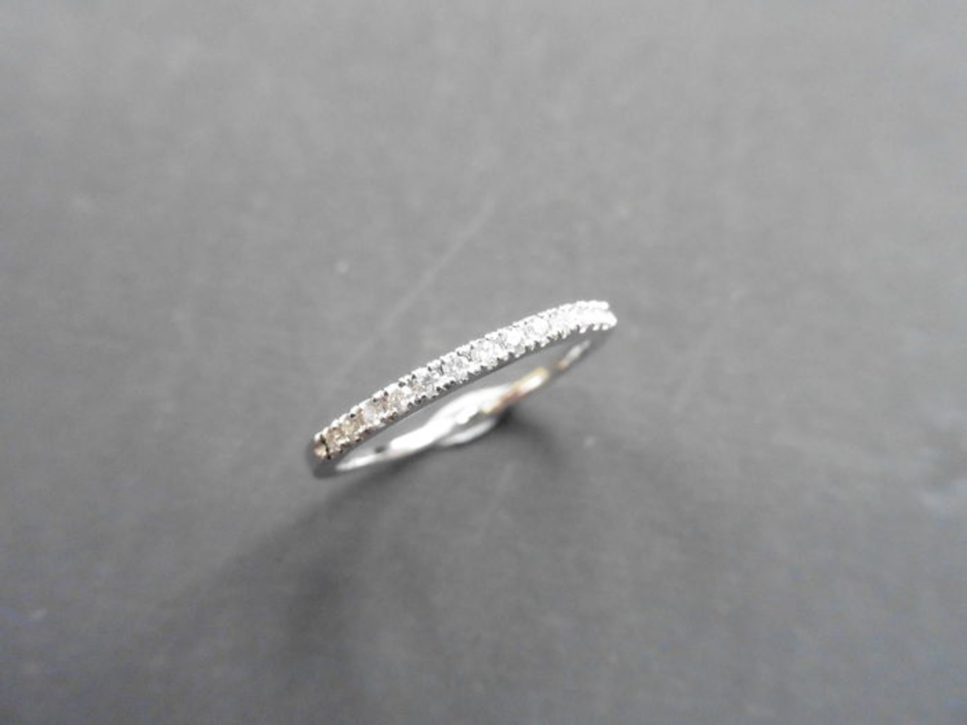 0.13ct diamond eternity ring set in 14ct white gold size L. I colour, si2 clarity in a micro claw