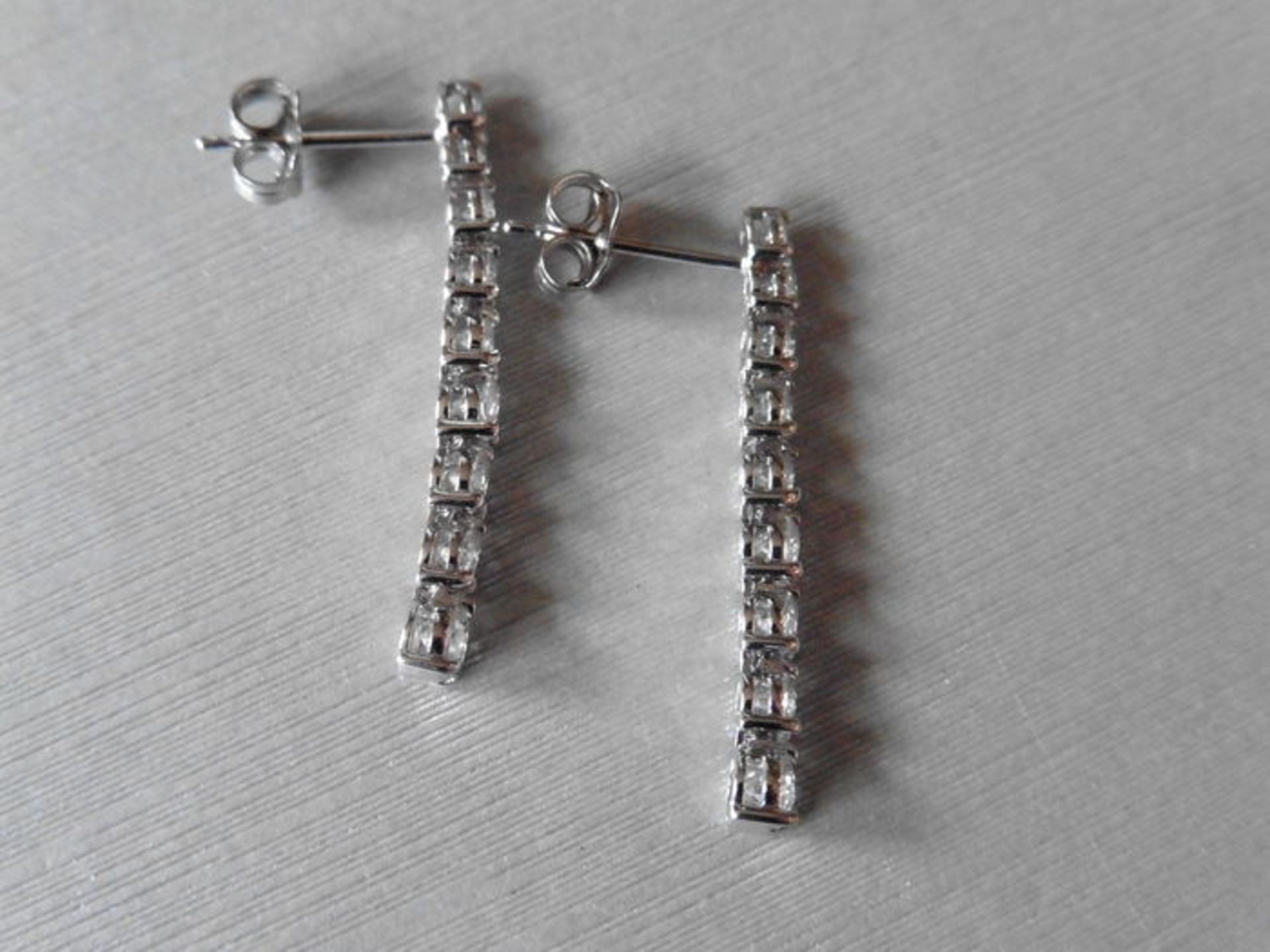 1.50ct graduated diamond drop earrings. Graduated brilliant cut diamonds, I colour, si2 clarity - Image 3 of 4