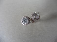 1.40ct Diamond set solitaire style earrings. Each set with 0.70ct brilliant cut diamond, I colour,