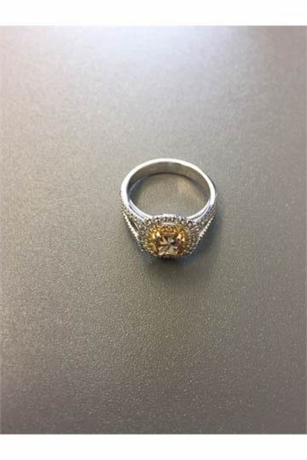 1.15ct diamond set solitaire ring with a yellow cushion cut yellow diamond and a halo setting and - Image 2 of 5
