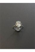 3.01ct diamond set solitaire ring. Oval cut diamond H colour si2 clarity in the centre with a halo