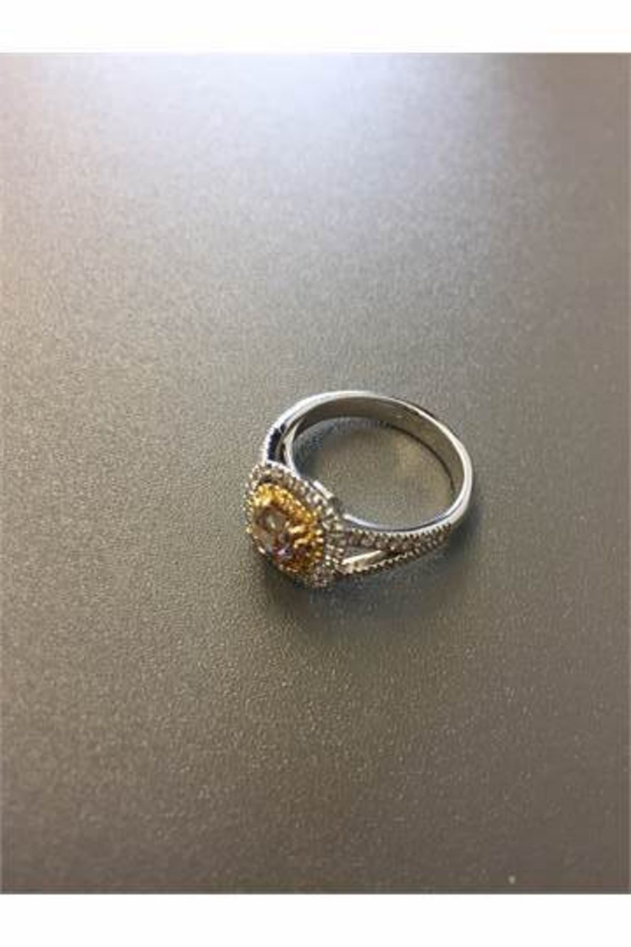 1.15ct diamond set solitaire ring with a yellow cushion cut yellow diamond and a halo setting and - Image 3 of 5
