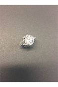 2ct diamond set solitaire ring. Brilliant cut diamond D colour and Si3 clarity. Halo setting which