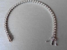 3.10ct 18ct white gold diamond tennis style bracelet set with brilliant cut diamonds. I colour,