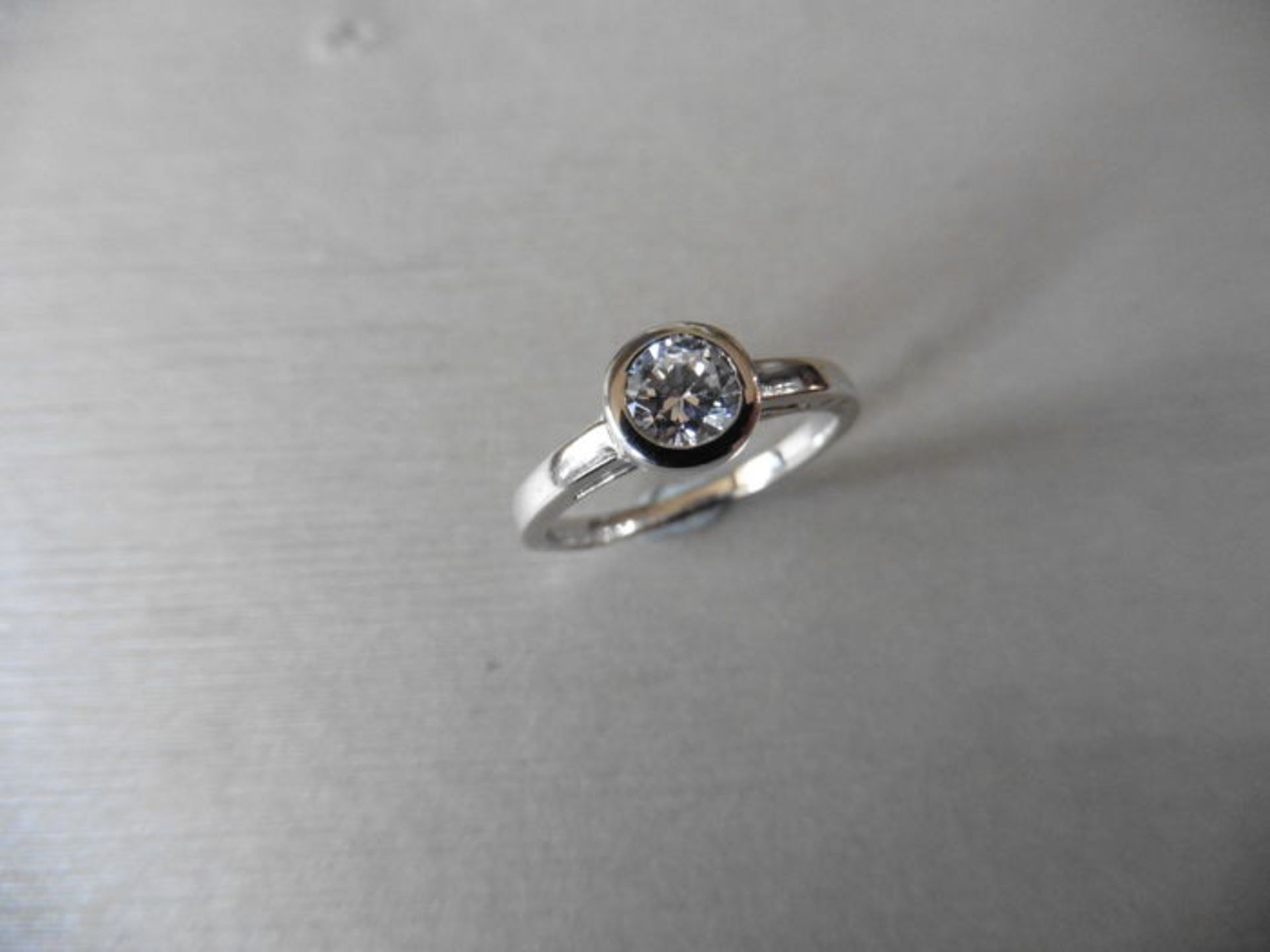 0.50ct diamond solitaire ring. Brilliant cut diamond, I/J colour, si2 clarity. Rub over setting in