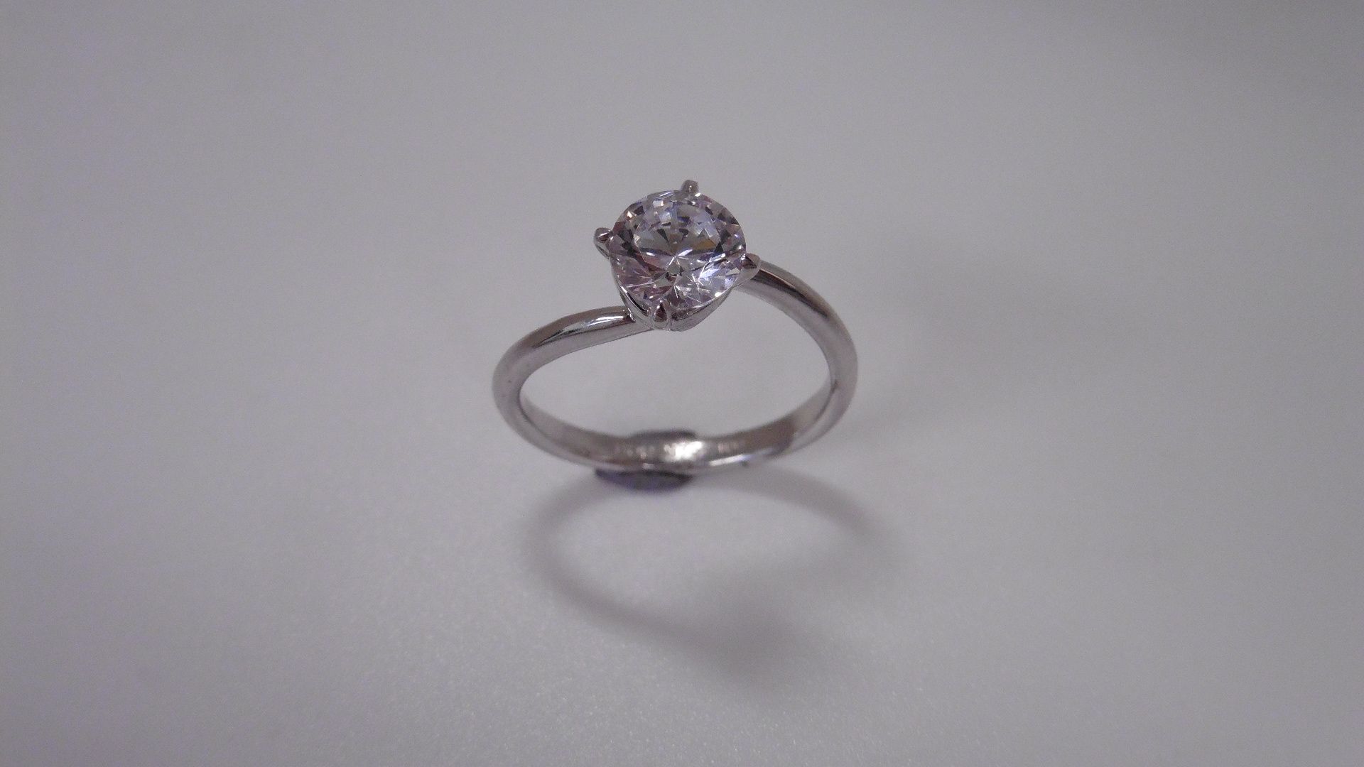 0.70ct diamond solitaire ring set in platinum. I colour, I1 clarity. 4 claw setting on a slight