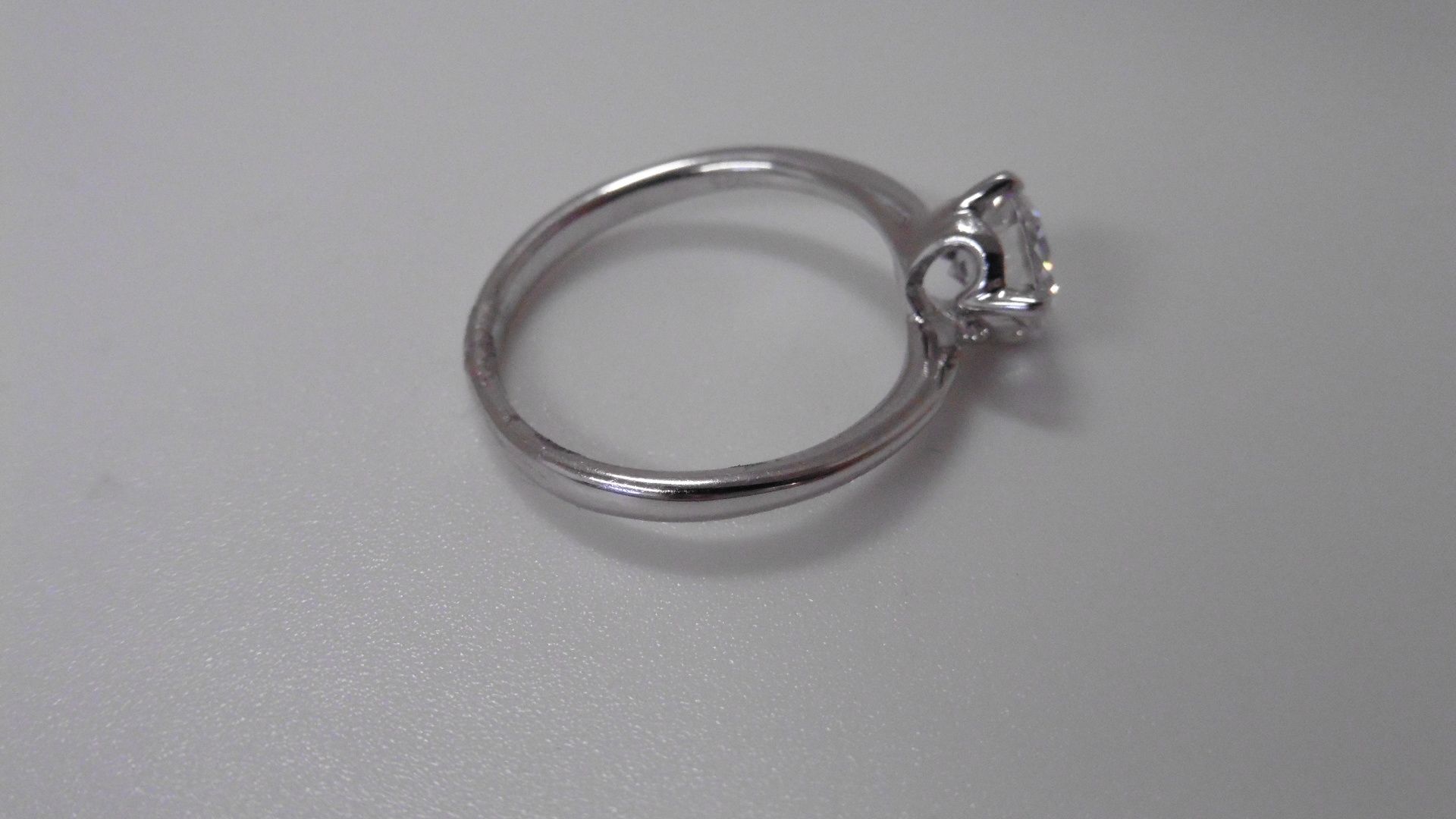 0.70ct diamond solitaire ring set in platinum. I colour, I1 clarity. 4 claw setting on a slight - Image 3 of 3