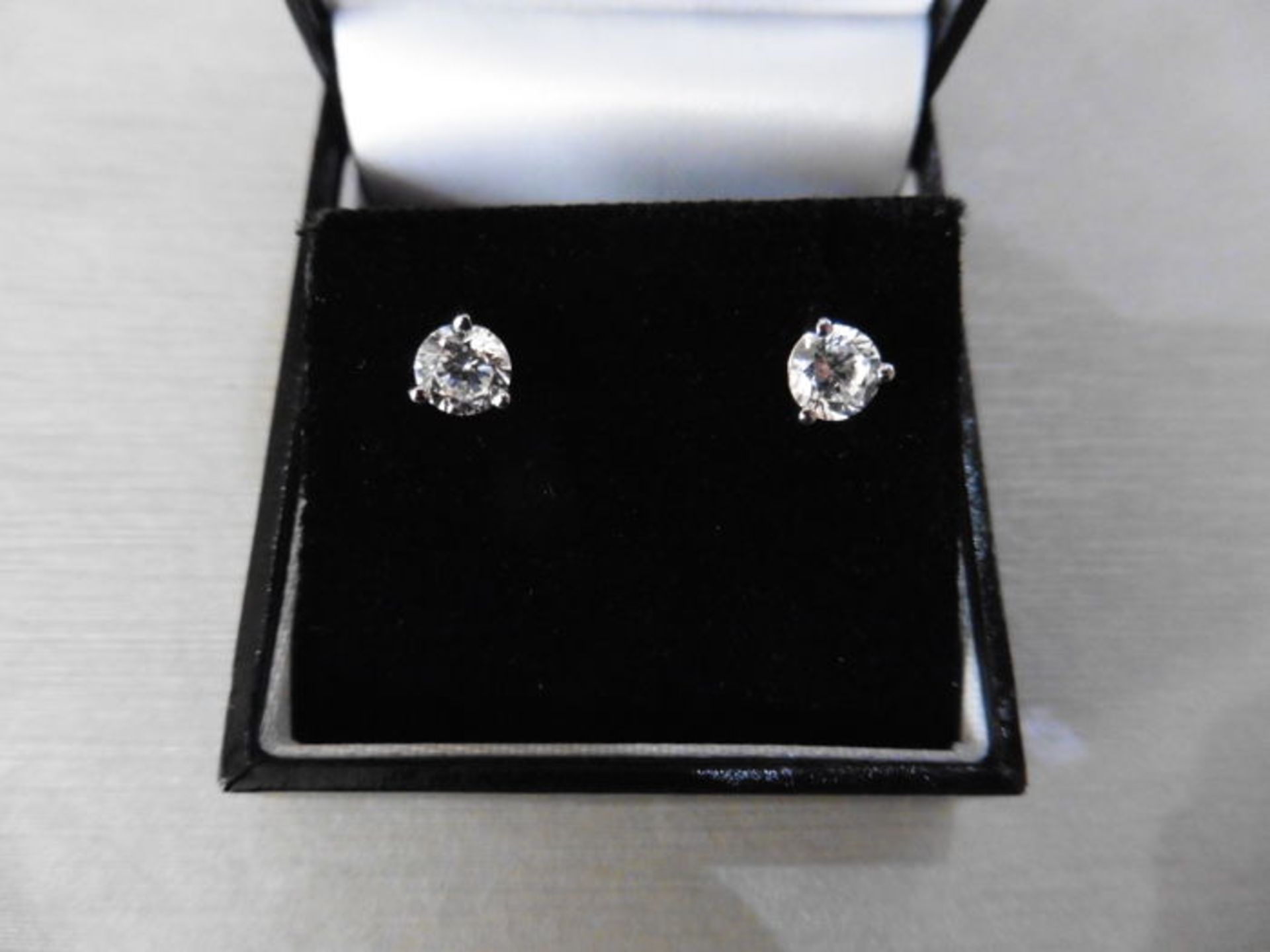 1.00ct diamond solitaire stud earrings set in platinum. 3 claw setting with brilliant cut - Image 2 of 3