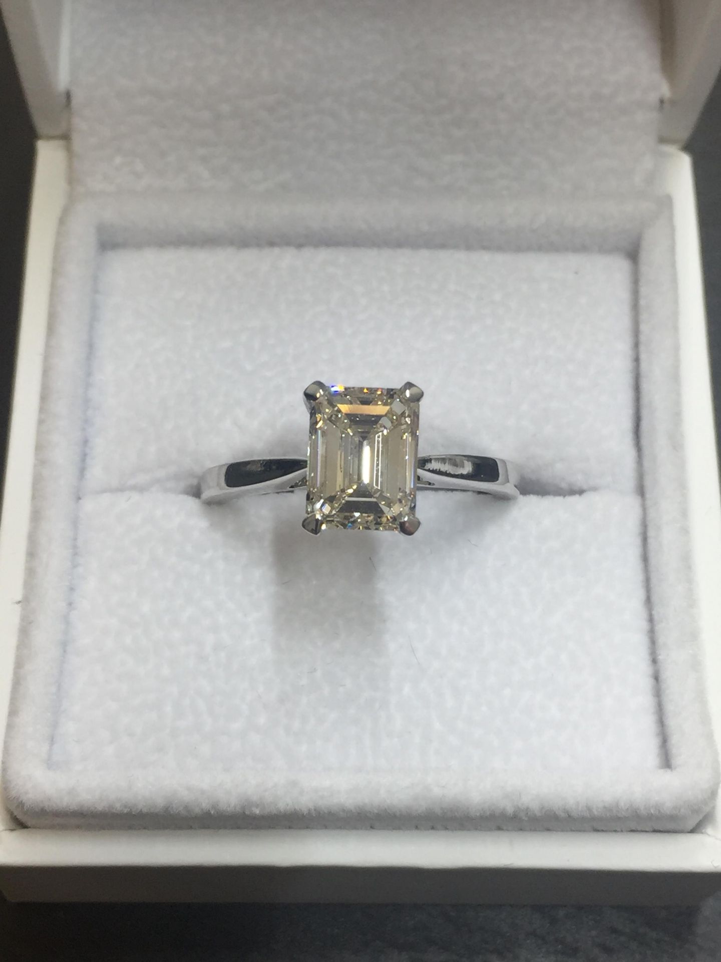 2ct diamond solitaire ring set with an emerald cut diamond, N ( light brown ) colour and VS1 - Image 3 of 5