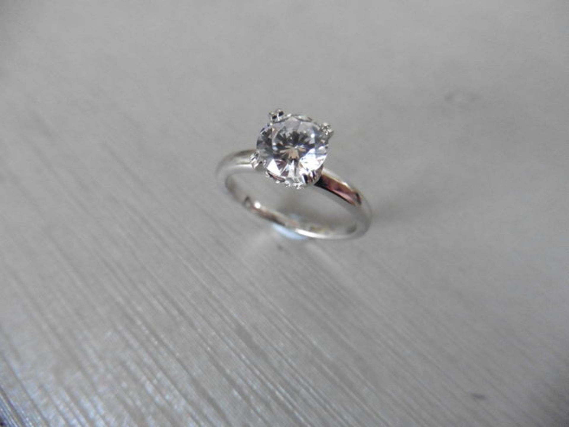 0.70ct diamond solitaire ring set in platinum. I colour, I1 clarity. 4 claw setting with diamond set - Image 4 of 4