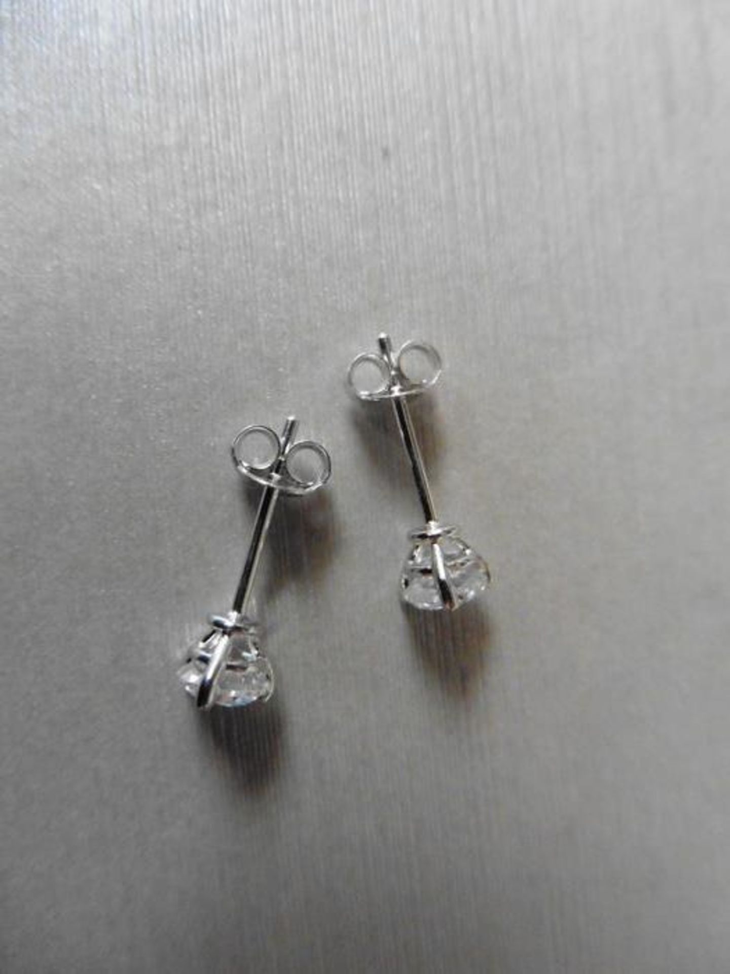 1.00ct diamond solitaire stud earrings set in platinum. 3 claw setting with brilliant cut - Image 3 of 3