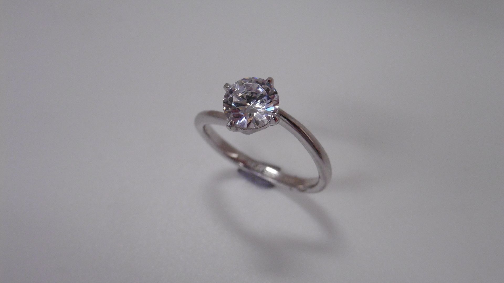 0.70ct diamond solitaire ring set in platinum. I colour, I1 clarity. 4 claw setting on a slight - Image 2 of 3