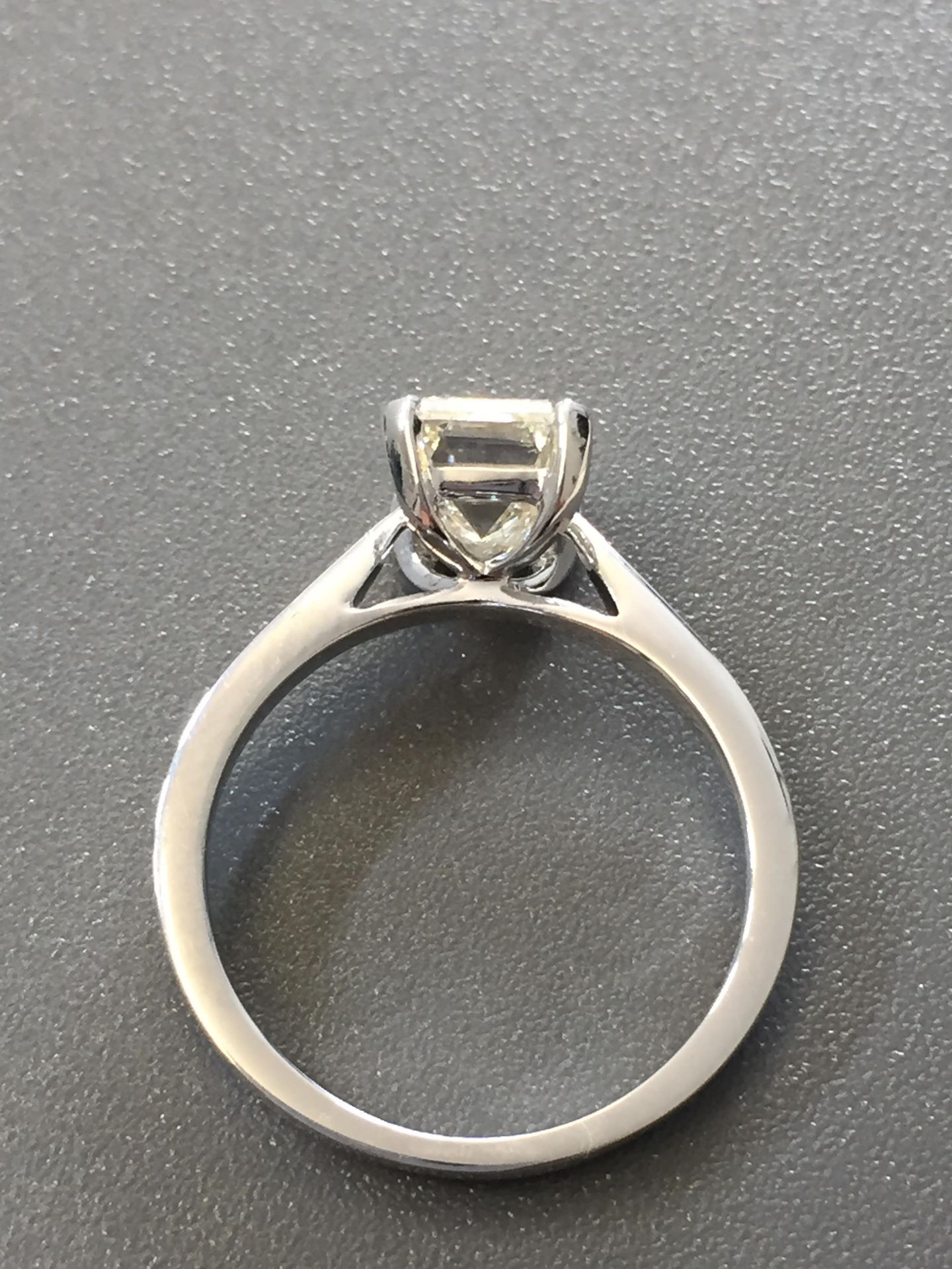 2ct diamond solitaire ring set with an emerald cut diamond, N ( light brown ) colour and VS1 - Image 2 of 5