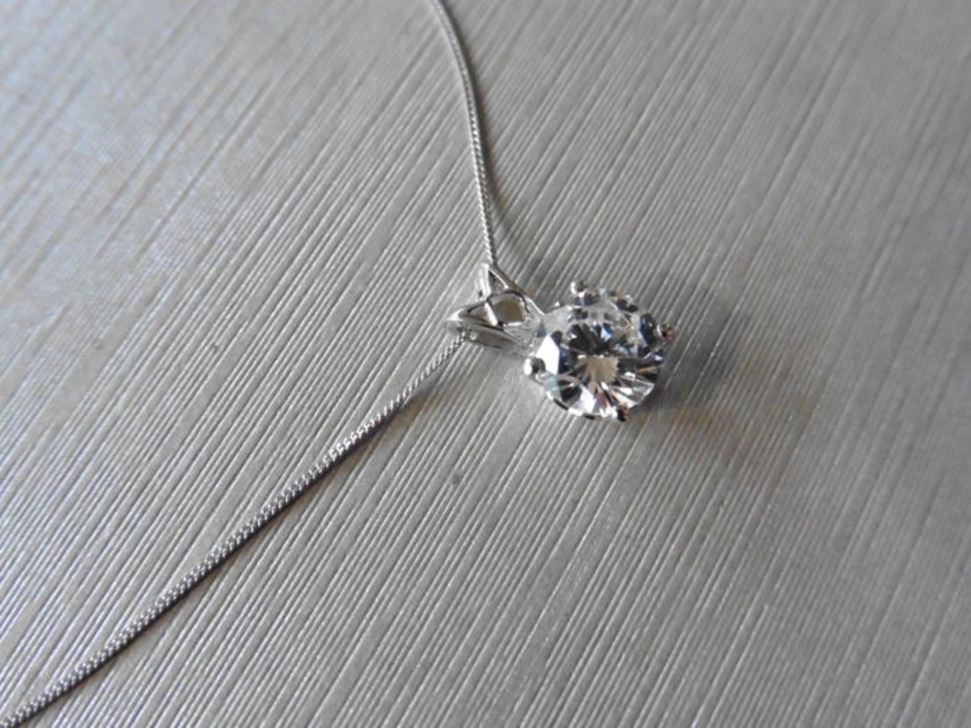 0.70ct diamond solitaire style pendant. Brilliant cut diamond, I colour and I1 clarity. Set in a 4
