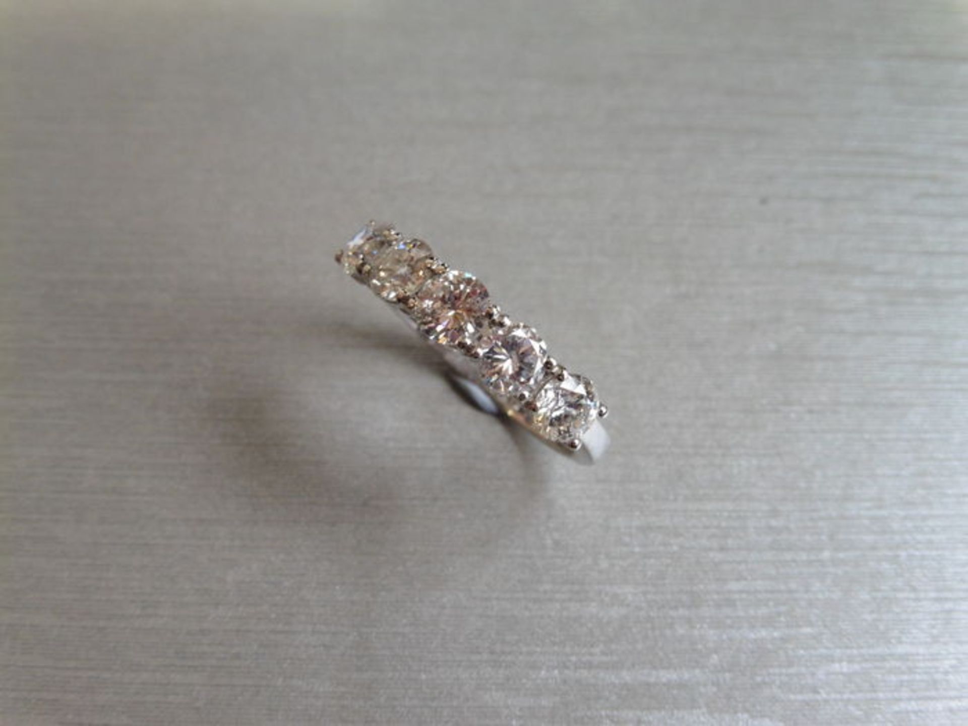 1.50ct diamond five stone ring. 5 brilliant cut diamonds, I colour, si2-3 clarity. 4 Claw setting in