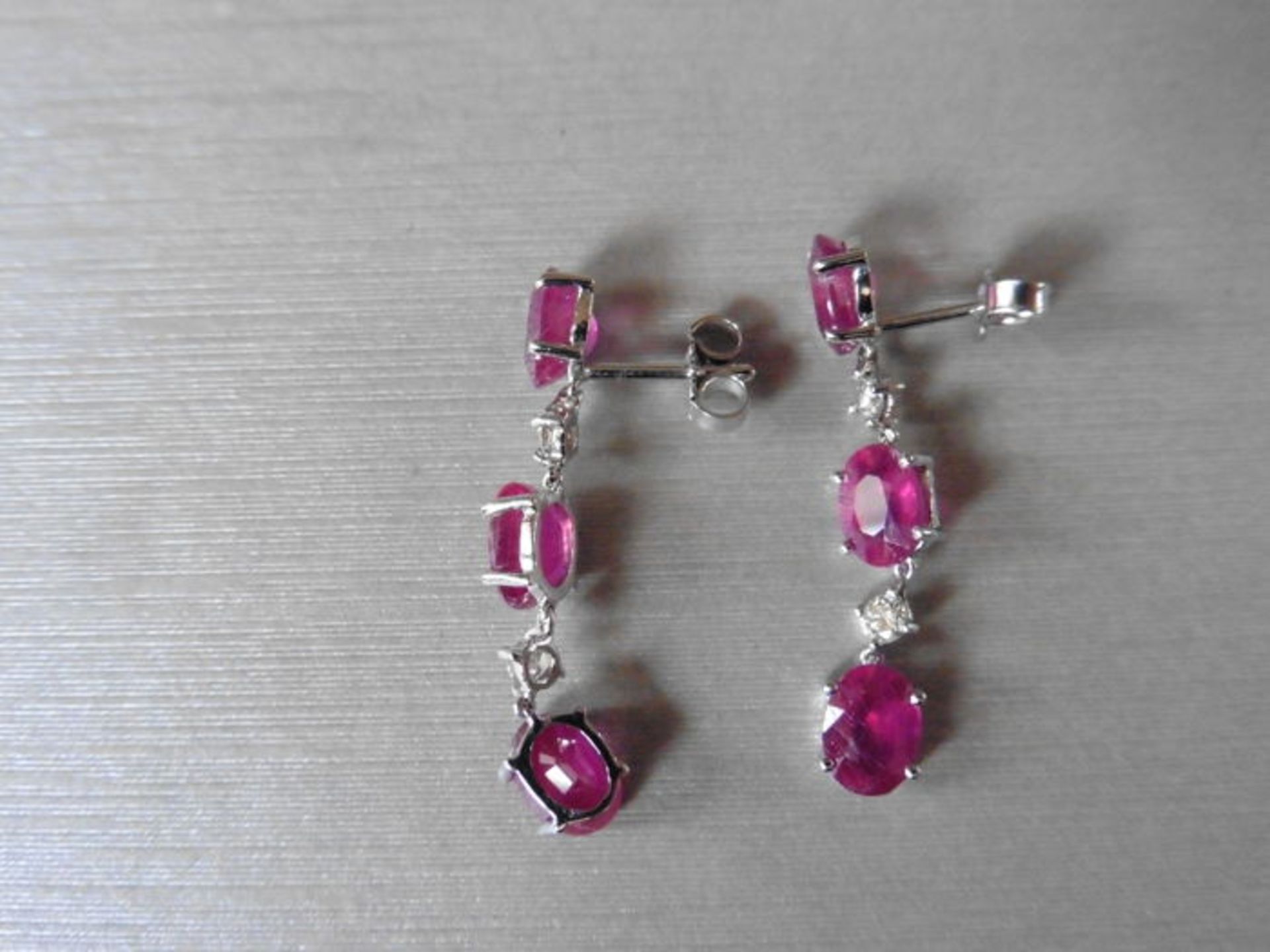 4.80ct ruby and diamond drop earrings set in platinum. Each set with 3 oval cut rubies ( glass - Image 3 of 3