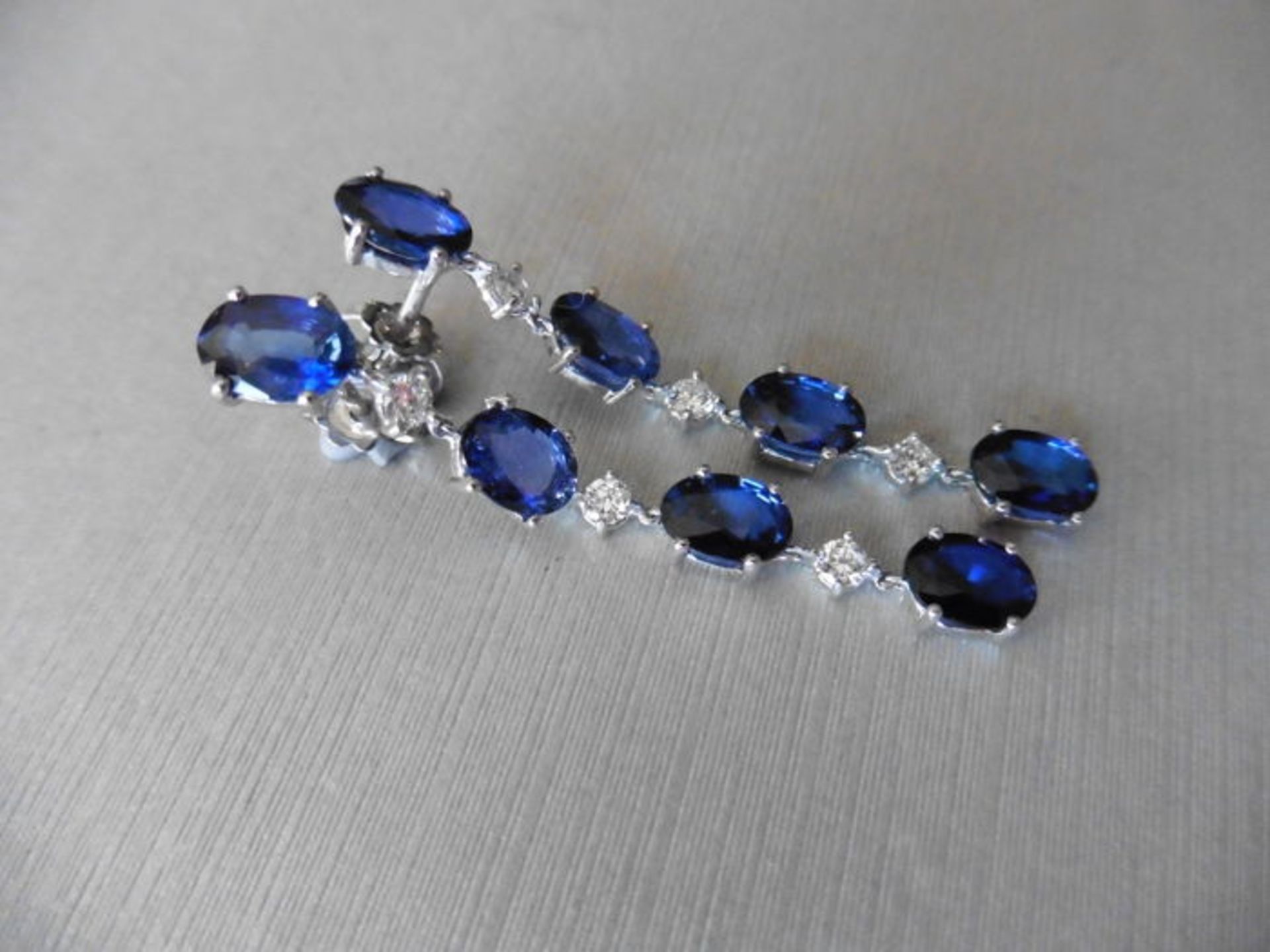 Sapphire and diamond drop style earrings set in platinum. Each set with 4 oval cut ( treated) - Image 2 of 3