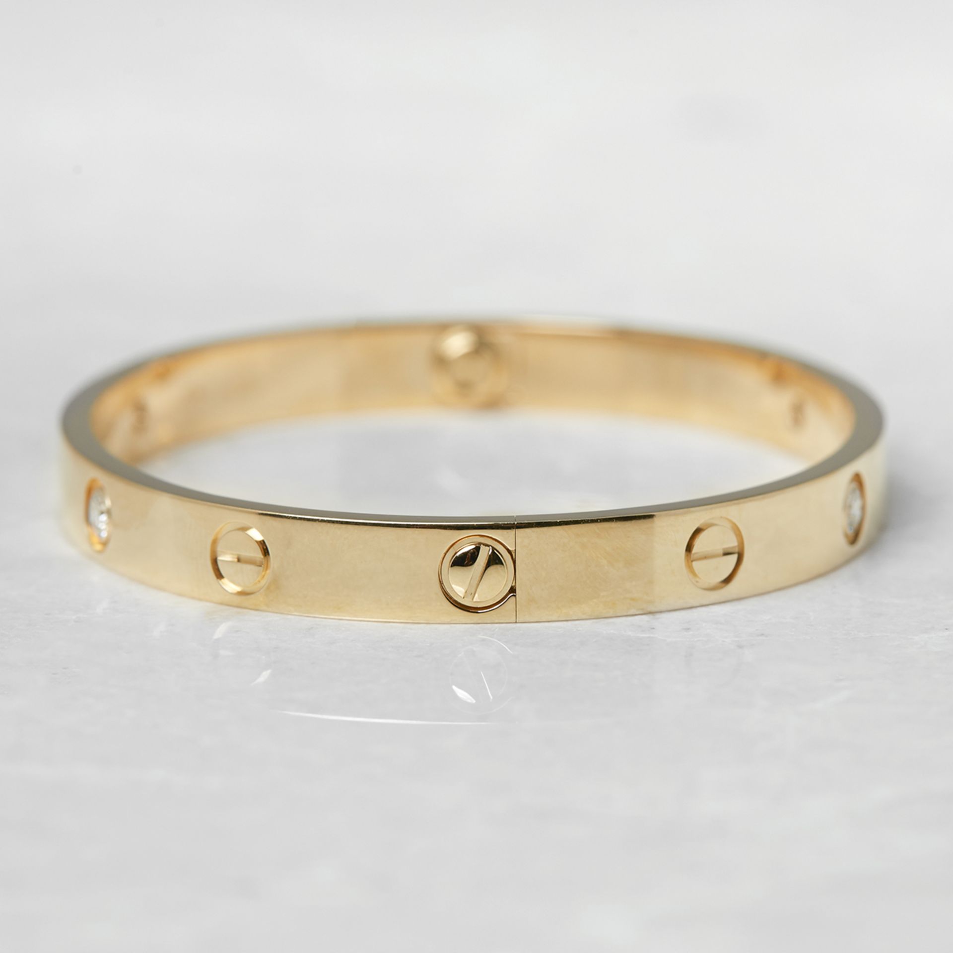 Cartier, 18k Yellow Gold 4 Diamond Love Bracelet B6035917