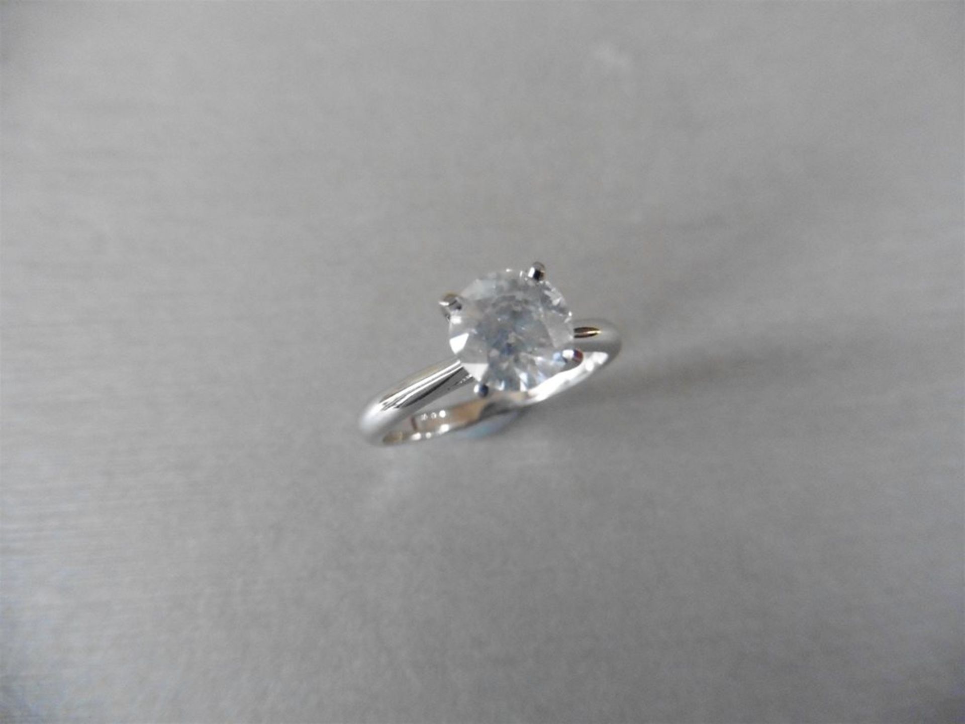 1.50ct diamond solitaire ring set with an enhanced brilliant cut diamond, H colour I2 clarity. 4 cla