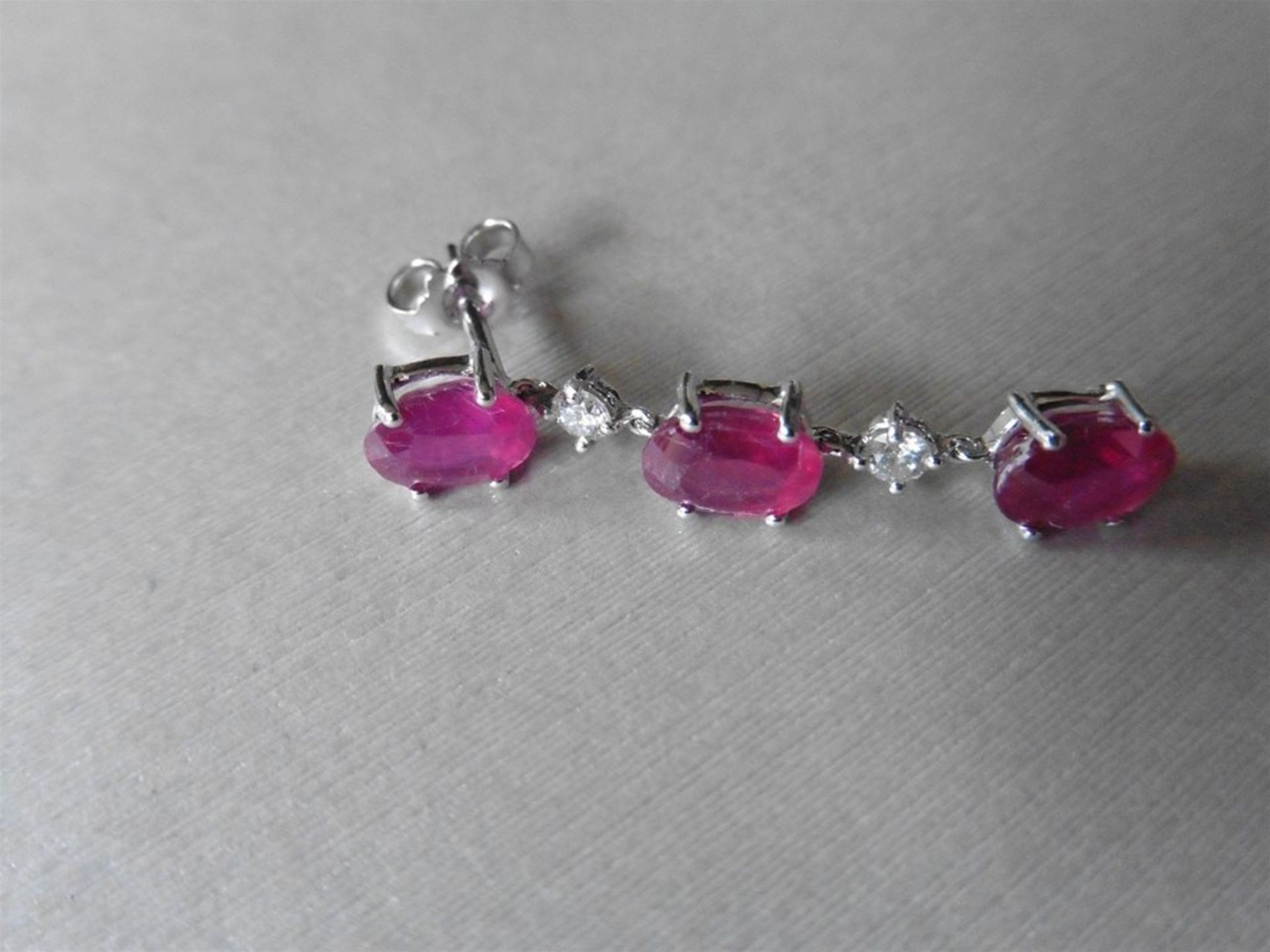 4.80ct ruby and diamond drop earrings. Each set with 3 oval cut rubies ( glass filled ) and 2 brilli - Image 3 of 4