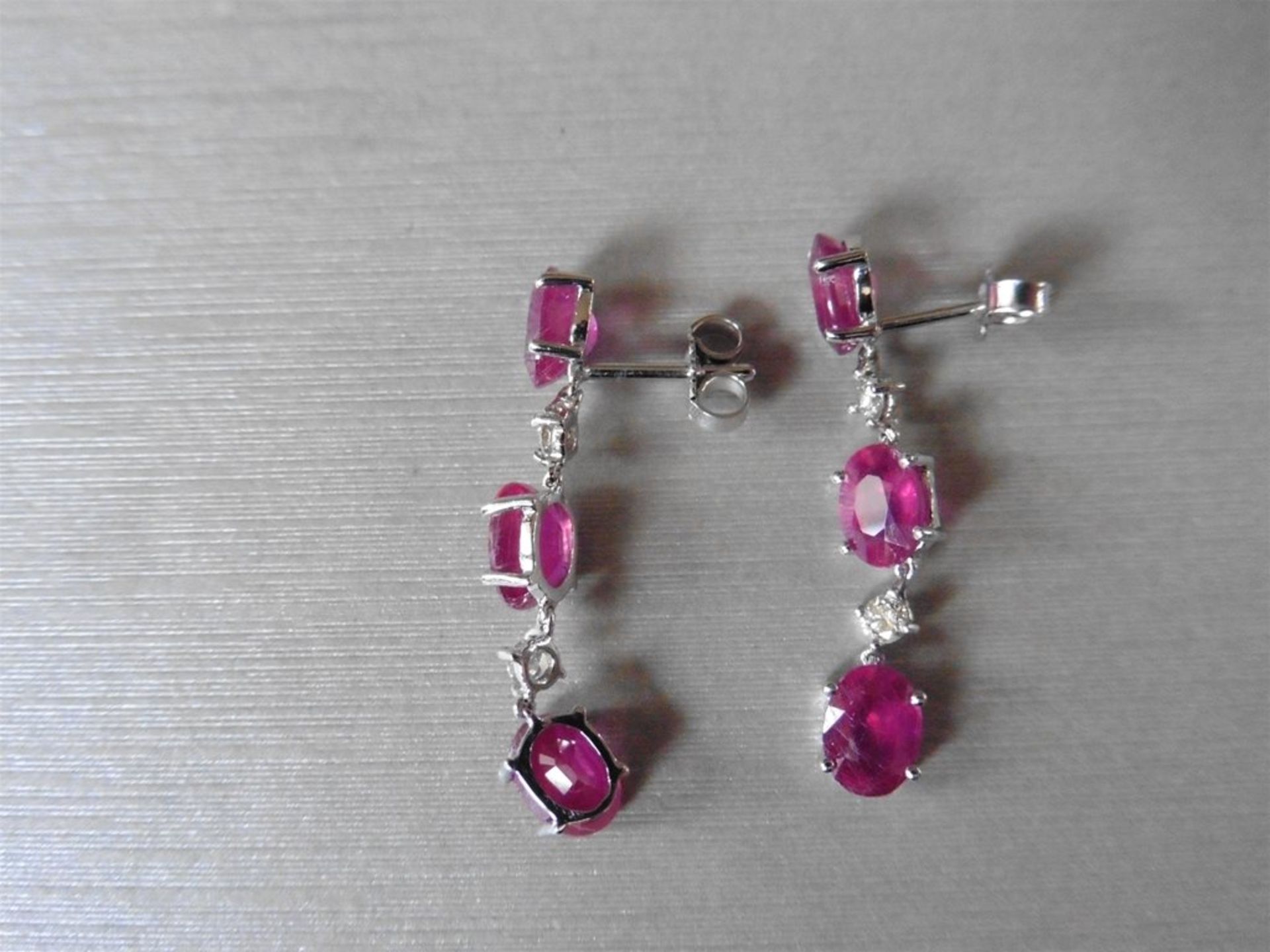 4.80ct ruby and diamond drop earrings. Each set with 3 oval cut rubies ( glass filled ) and 2 brilli - Image 2 of 4