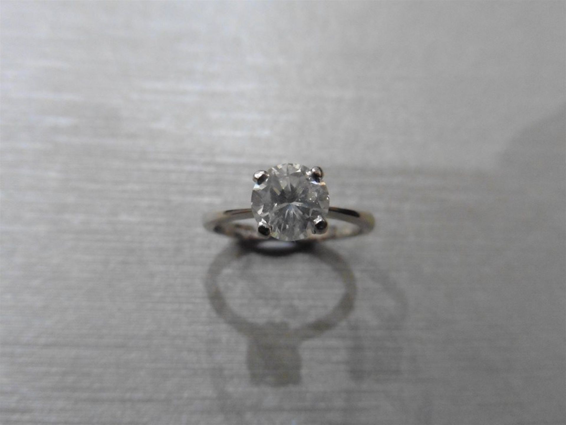 1.20ct diamond solitaire ring set with an enhanced brilliant cut diamond, I colour I1-2 clarity. 4 c - Image 3 of 3