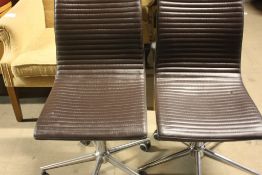 pair of italian designer office chairs with gas lift on castors