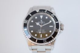 ROLEX 14060M NON DATE SUBMARINER 2009 ENGRAVED REHAUT 2009 WTY CARD