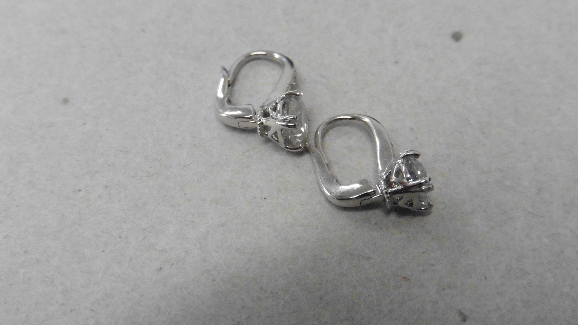 18ct white gold hoop style earrings with hinge fastners. Brilliant cut diamonds, I colour and I1 - Image 4 of 4