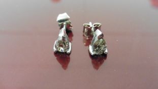 0.70ct pear shaped diamond stud style earrings. 2 x 0.35ct pear diamonds, I-J colour, si2 clarity.