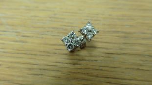 0.80ct cluster style stud earrings set in 18ct white gold. Brilliant cut diamonds, I colour, si2