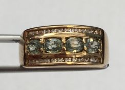9k Gold Aquamarine & Diamond Ring