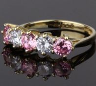 9CT GOLD PINK AND PURPLE CUBIC ZIRCONIA FIVE STONE RING